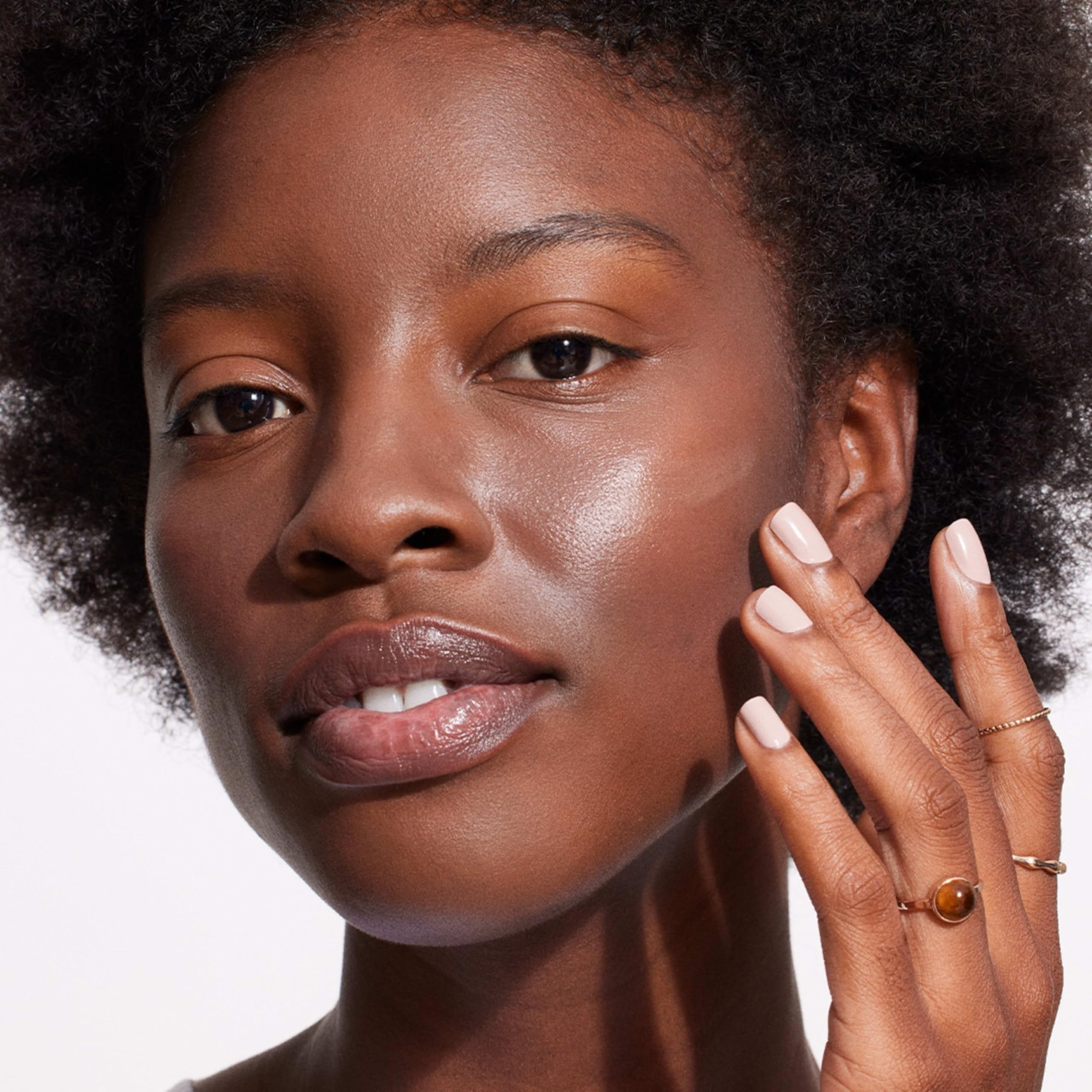 Neutrogena Purescreen Vitamin E closeup shows nourishing, skin-softening formula.
