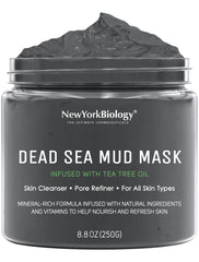 New York Biology Dead Sea Mud Mask on the face during application for pore refinement.
