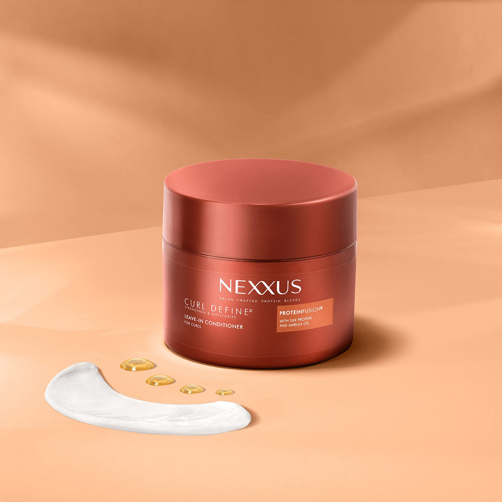 Nexxus Curl Define frizz-control shot shows smoother curls in humidity.