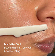 Nimbi Dermaplaner Razor used for precise eyebrow shaping.