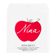 Nina Ricci Nina fragrance outer packaging box emphasizes candy apple aesthetic.