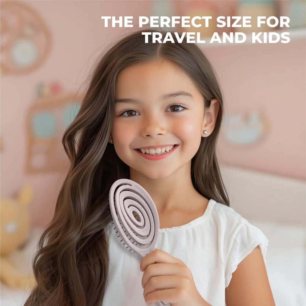Ninabella Mini Spiral Brush scalp massage feature provides gentle relief while brushing