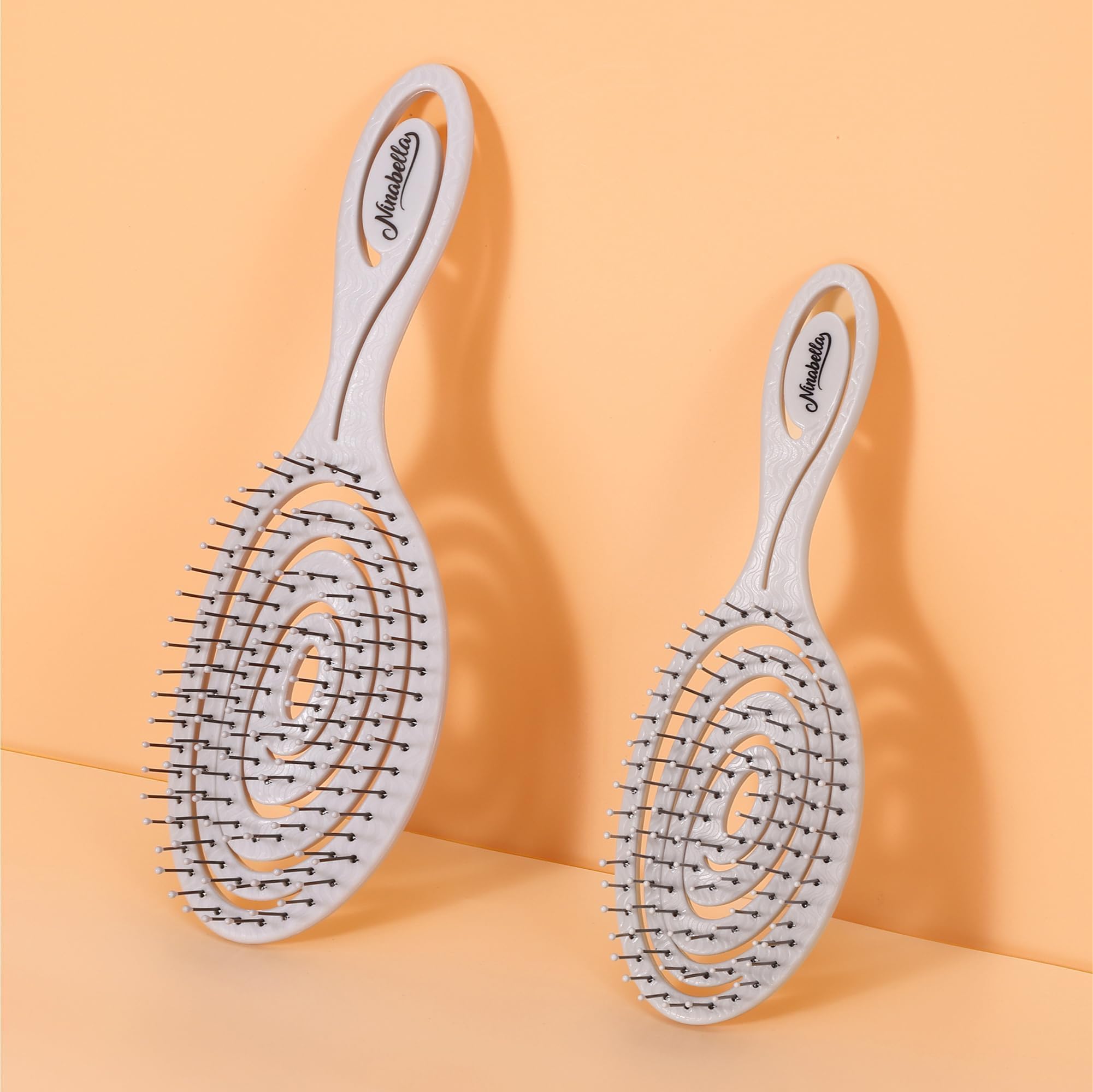 Ninabella Mini Spiral Brush travel compact fits bags for on-the-go styling