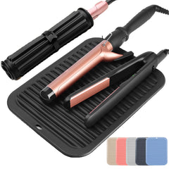 Ninwod large silicone heat resistant mat laid flat with curling irons for organized counter space.