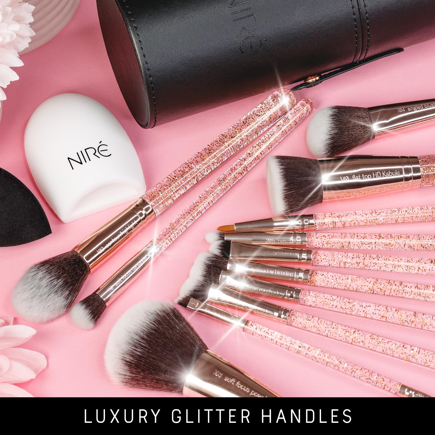 Niré Beauty glitter brush set on vanity with soft lighting