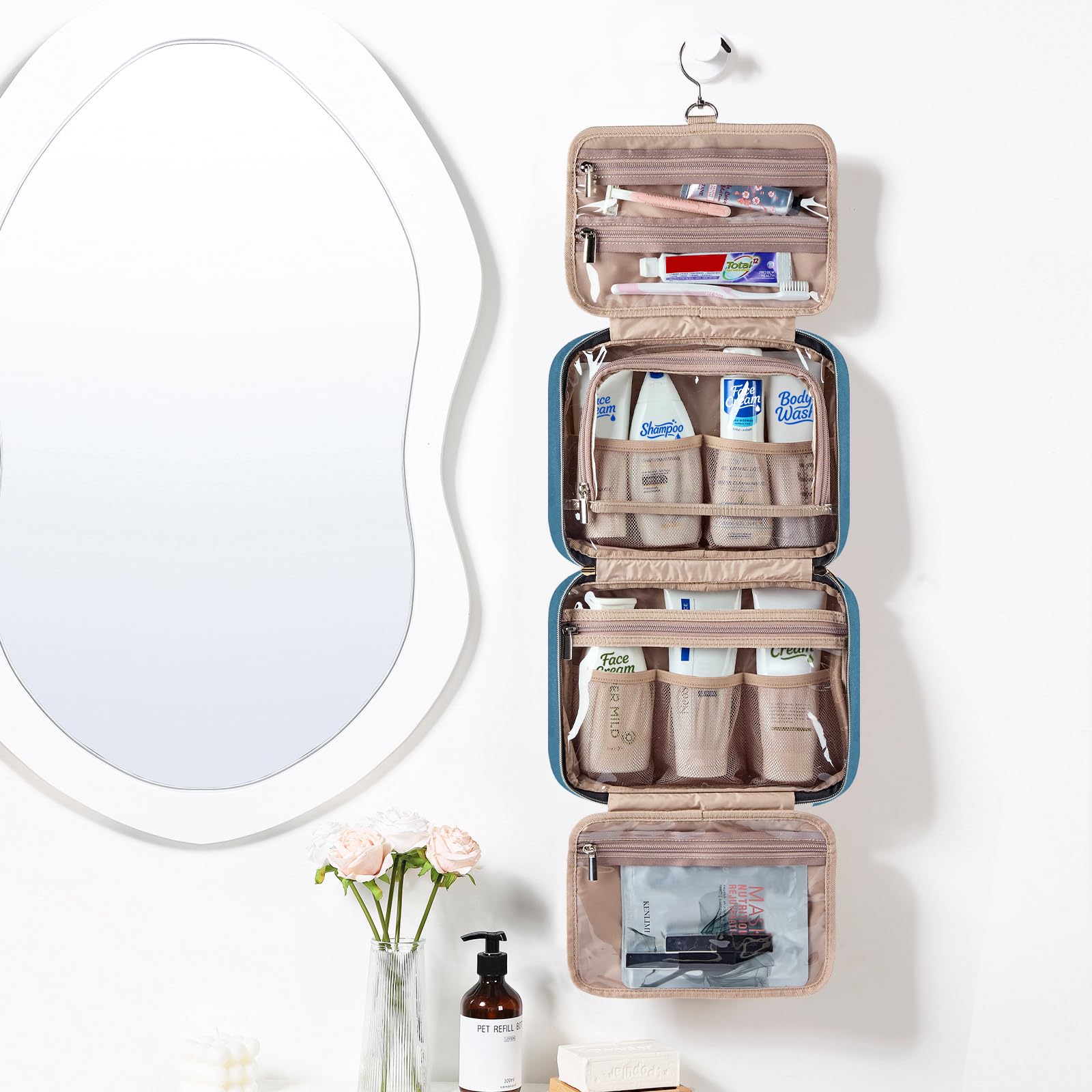 NISHEL bag lake-blue hanging demonstrates easy access in hotels or gym lockers.