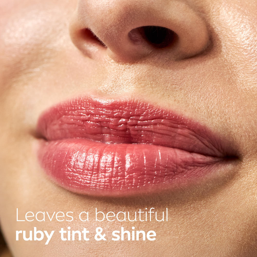 NIVEA Cherry Lip Care nourishing oils visible in gloss-like texture