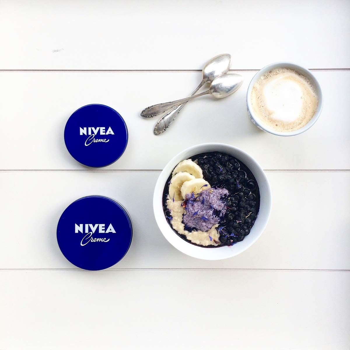 NIVEA Creme 200ml family-use display illustrating versatile moisturiser for whole family.