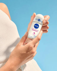NIVEA Extra Bright roll-on being applied on underarm for gentle, alcohol-free protection