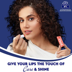 NIVEA Fruity Shine Peach swatch shows glossy peach finish.