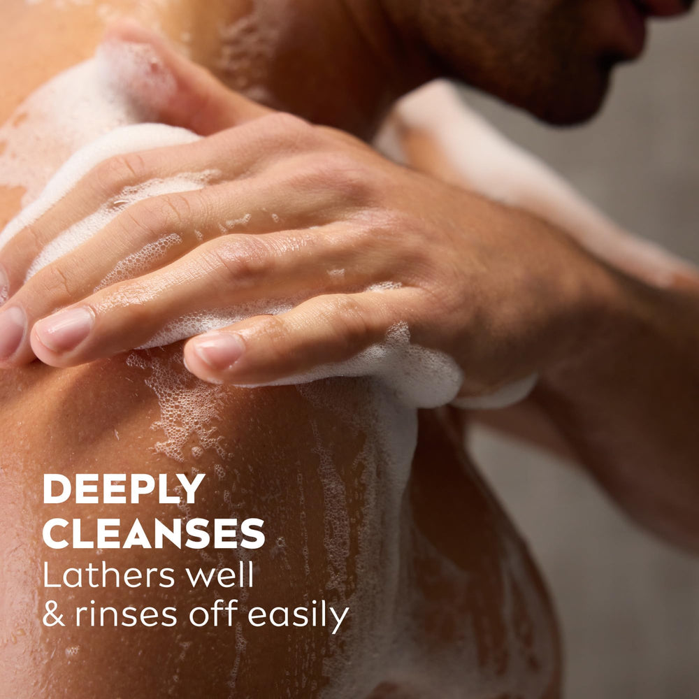 NIVEA MEN Active Clean Charcoal hair-wash foam on shower-ready hair.