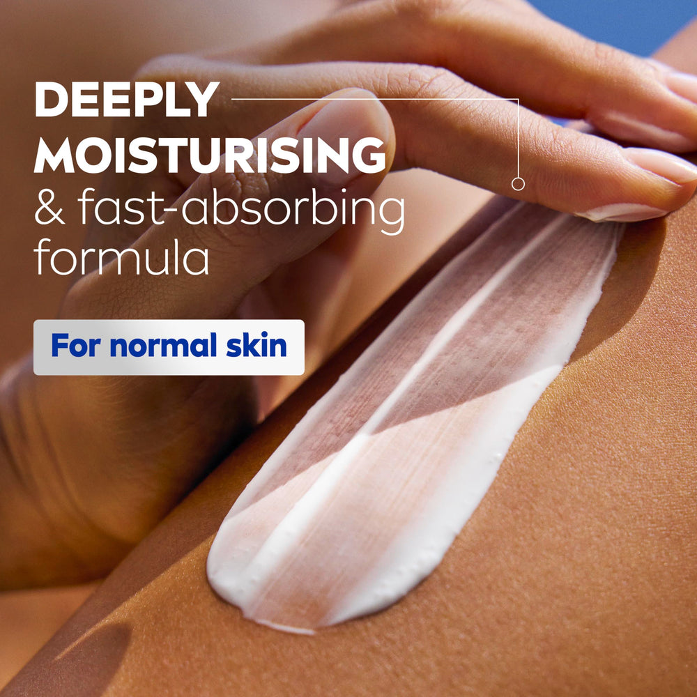 NIVEA Q10 Energy Plus firming lotion pump in action