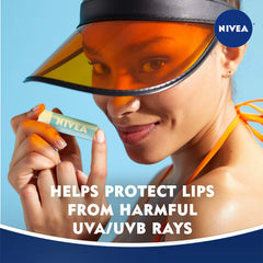 NIVEA Smoothness Lip Care on lips delivers soft, smooth lips.
