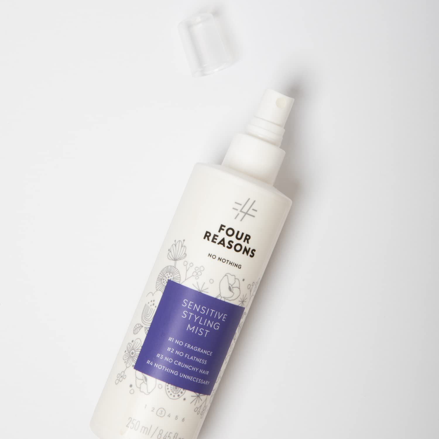 No nothing vegan cruelty-free styling mist label – clear packaging of ethical beauty.