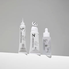 No7 Firming Booster Serum applicator-down demonstrates precise jawline and neck application.