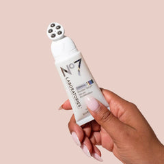 No7 Firming Booster Serum peppercorn-drop massage ready for targeted lifting.