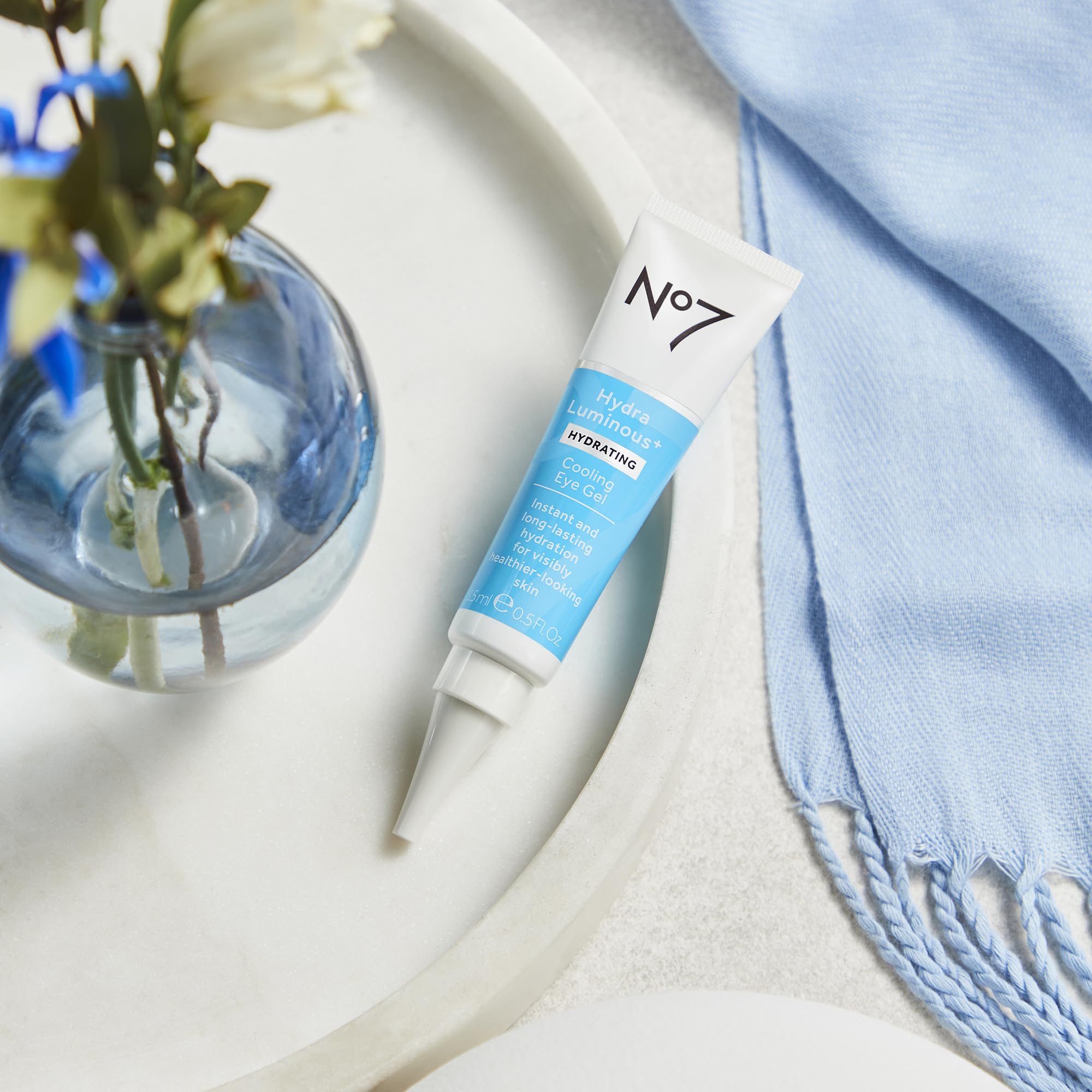 No7 HydraLuminous+ shield graphic emphasizes pollution defense for radiant-looking skin.