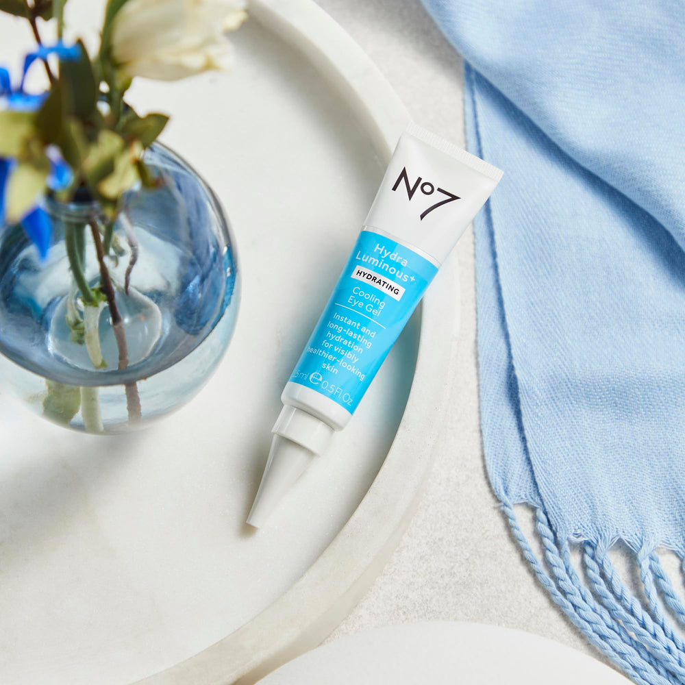 No7 HydraLuminous+ shield graphic emphasizes pollution defense for radiant-looking skin.