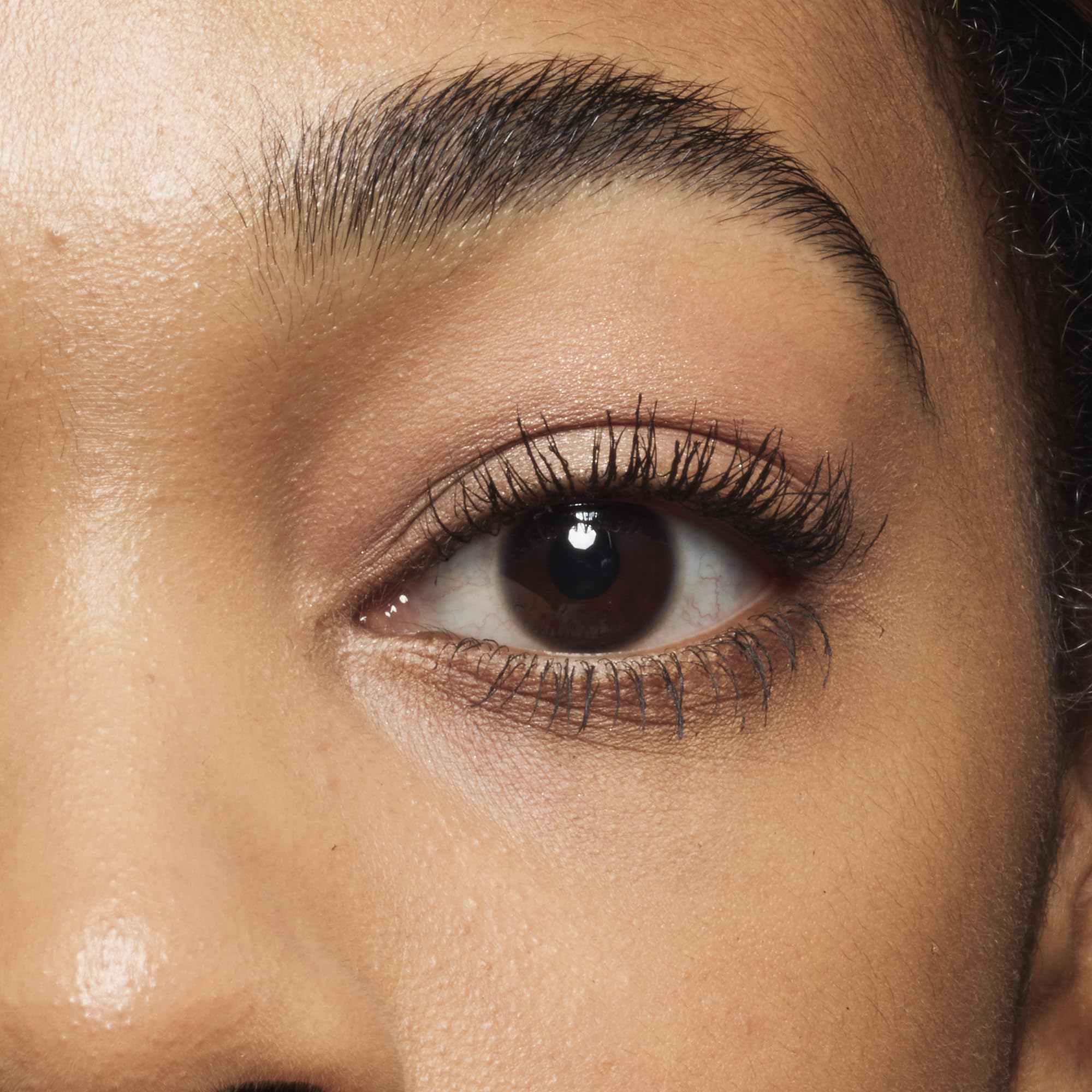 No7 Lash Extender Fiber Mascara on eyelashes delivering longer, fuller look with bamboo fibers.