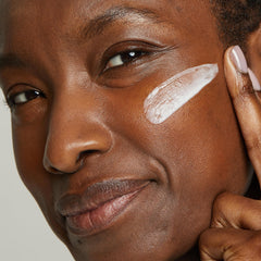 No7 Restore & Renew night cream applied to the face during a bedtime routine.