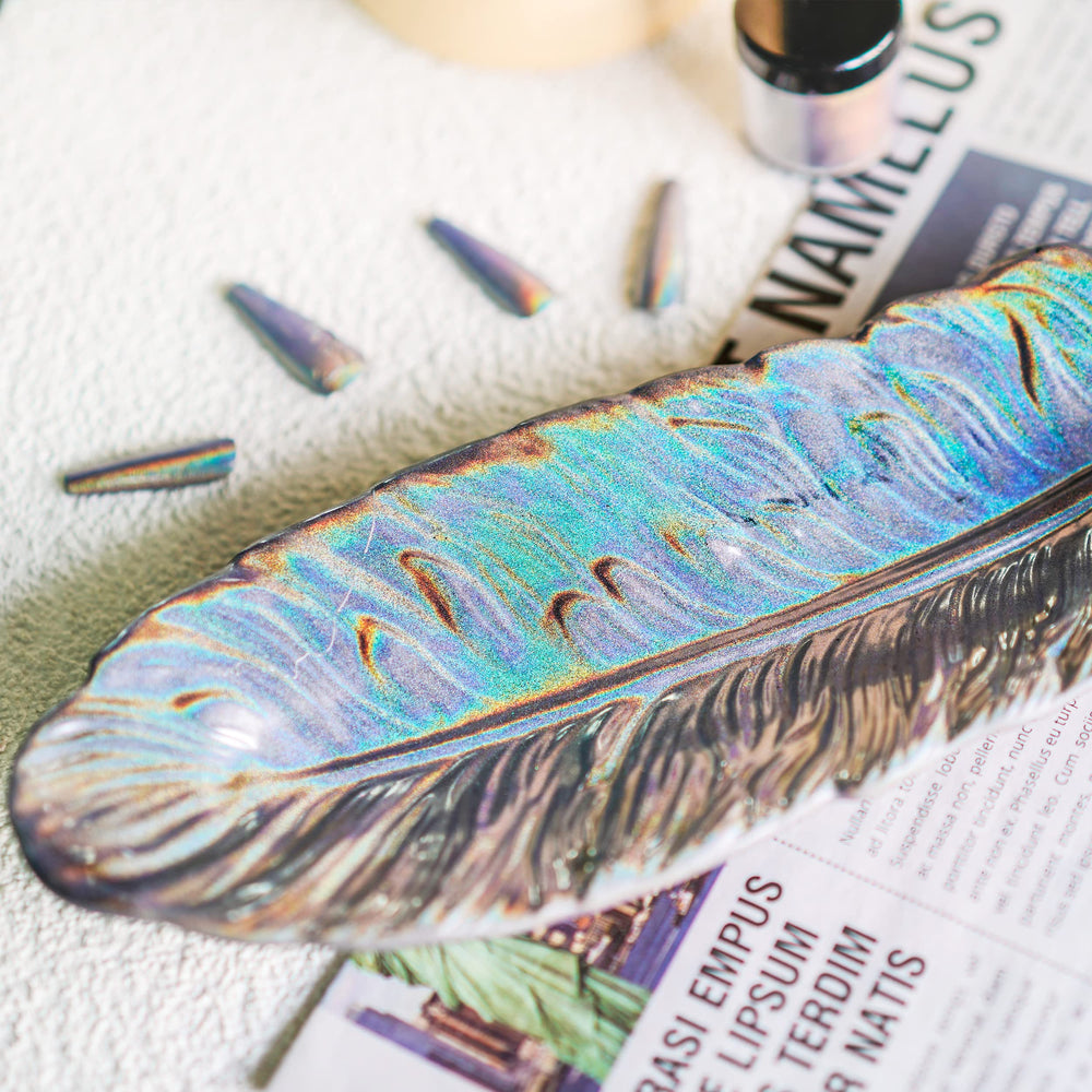 NODDWAY holographic powder applied to nails for rainbow holo nail art.