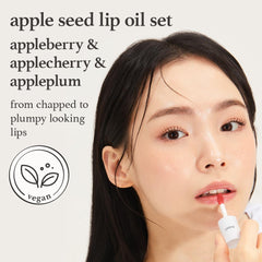 NOONI Appleseed Lip Oil Appleplum bottle closeup highlights vibrant shine.