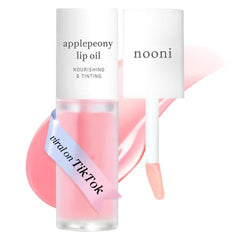 NOONI Applepeony lip oil bottle close-up shows silky texture and glow