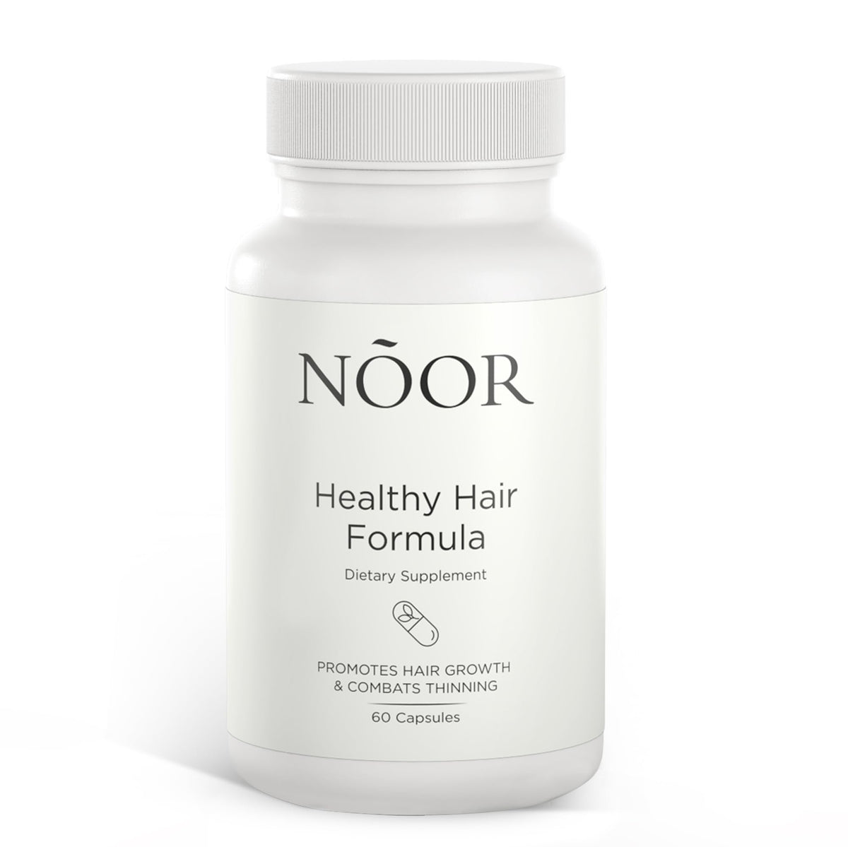 NOOR HAIR Healthy Hair Formula bottle on the counter ready for daily use.