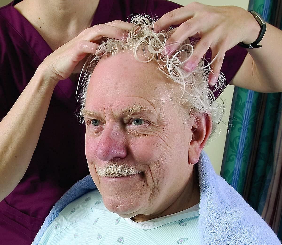 No-Rinse shampoo application on hair shows easy, waterless cleansing.