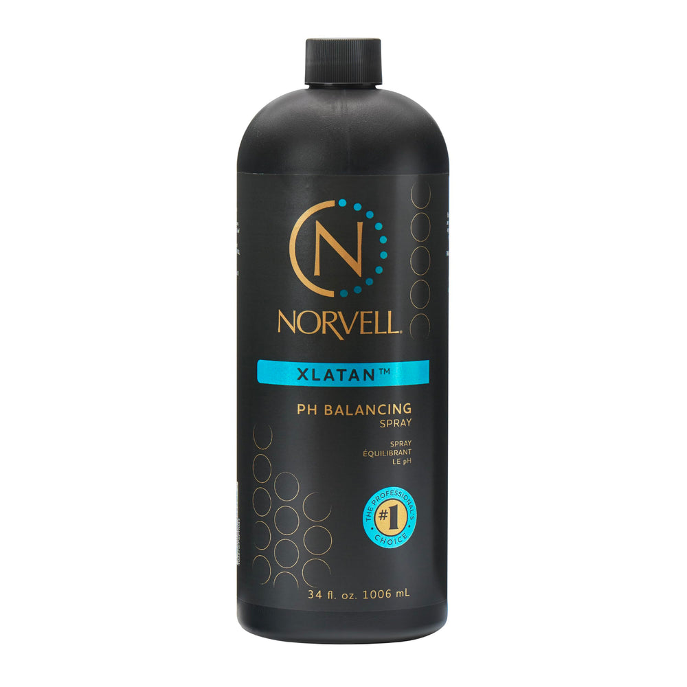 Norvell Pre-Spray Tan XLATAN bottle demonstrates pH-balancing spray for even color prep