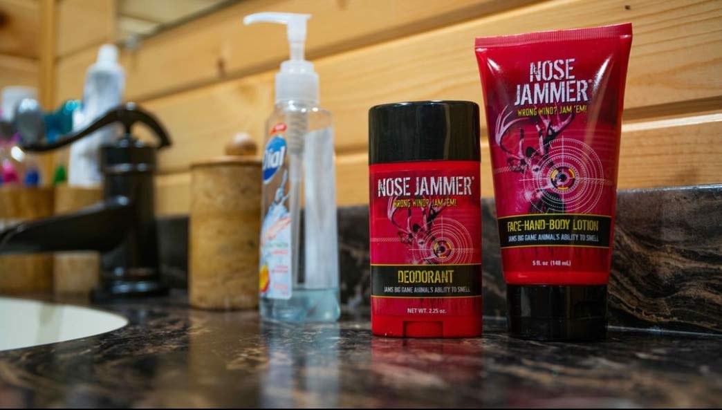 Nose Jammer's scent-away technology mimics natural scents for hunting concealment.