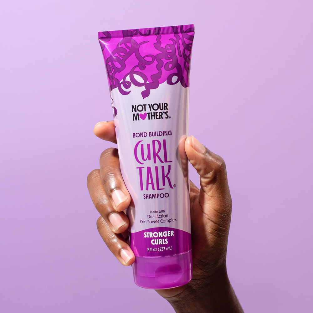 Not Your Mother's Curl Talk shampoo bottle close-up highlights citrus jasmine scent.