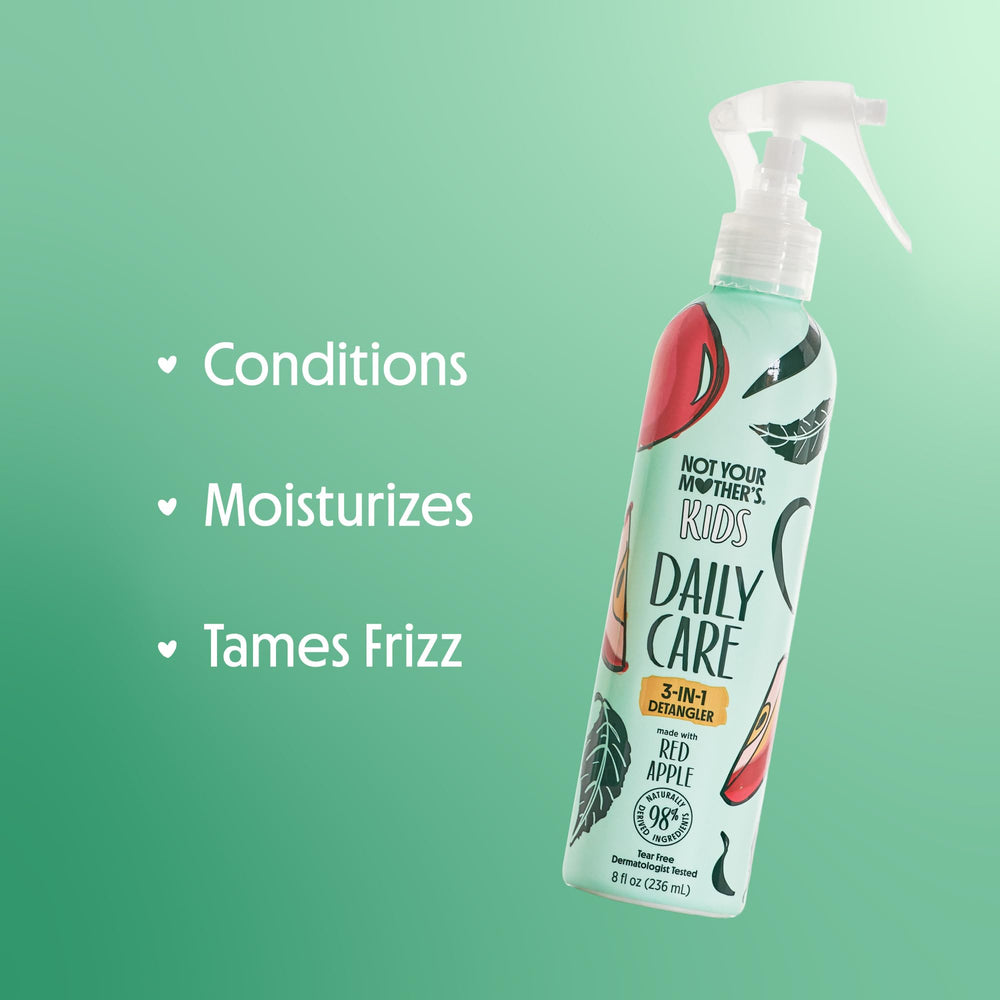 Not Your Mother's Kids Daily Care detangler spray application on hair for easy comb-through.