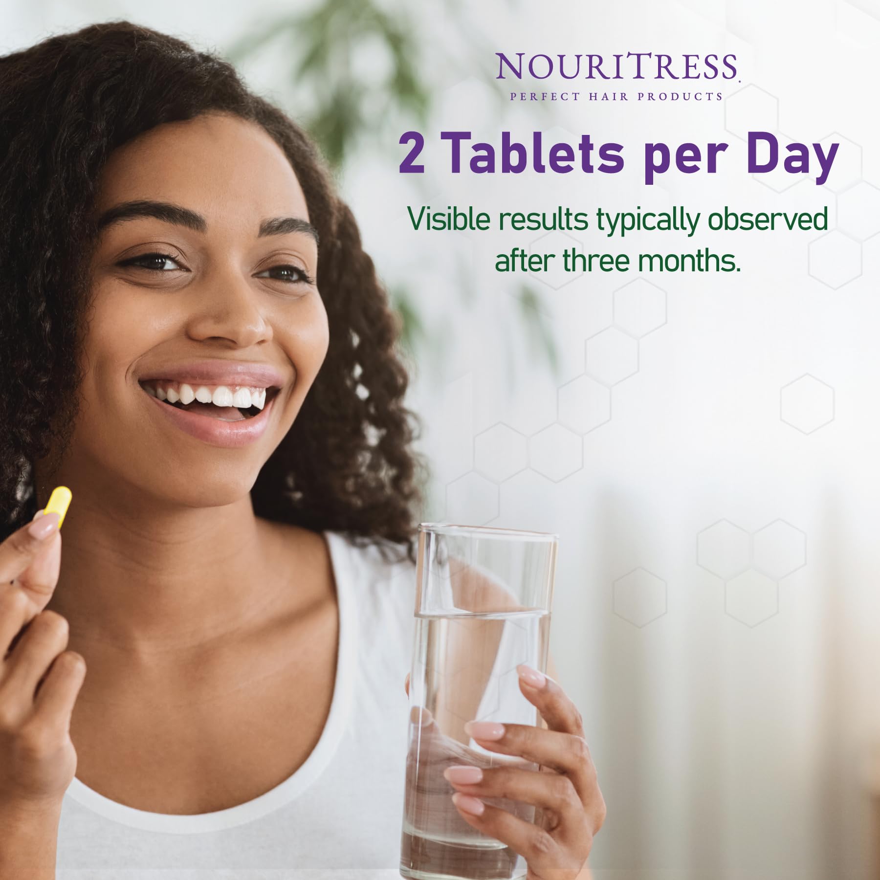 NouriTress Perfect Hair Vitamins Plus ingredient-closeup highlights biotin and vitamin E.