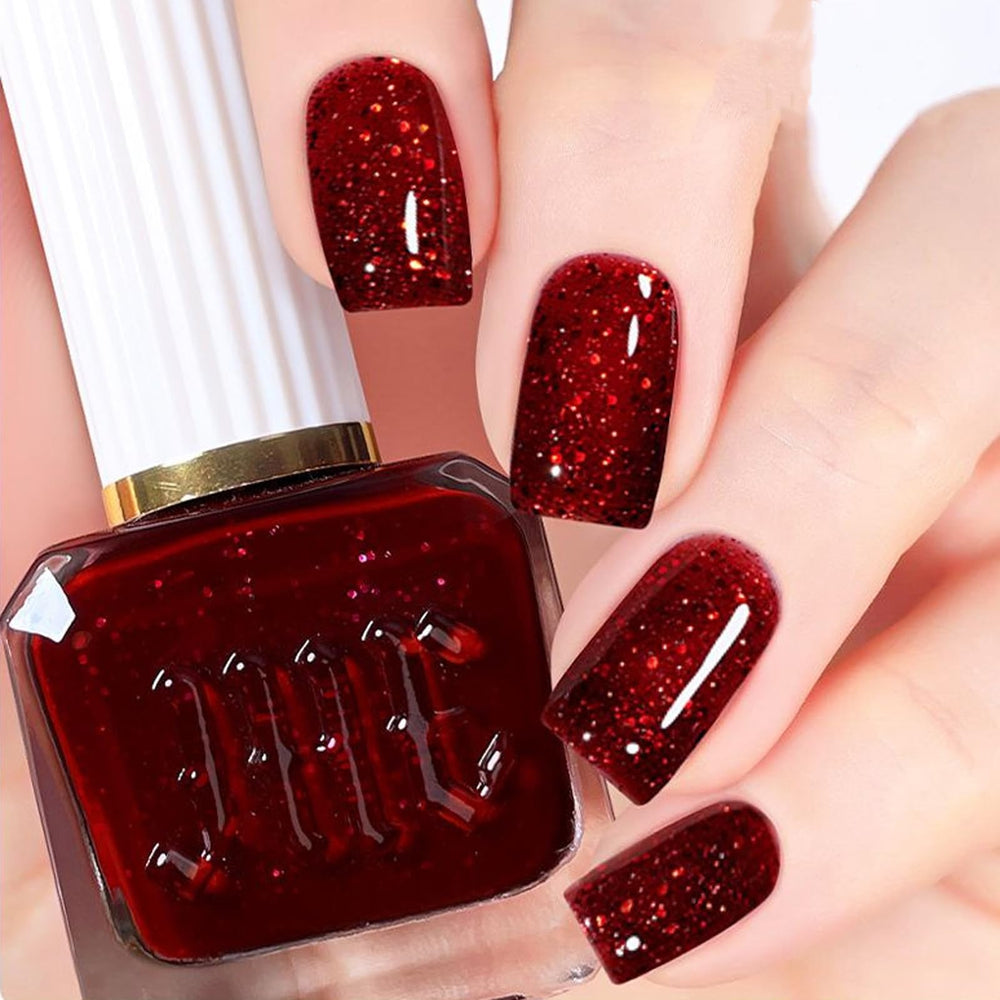 NovaCharm dark red nail polish bottle close-up with burgundy glitter shine for bold nails.