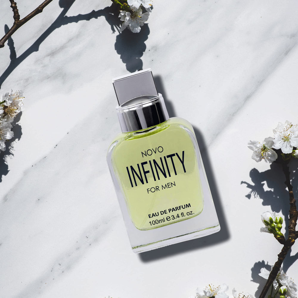 NovoGlow Infinity for Men top-notes citrus image suggests refreshing, versatile daytime scent