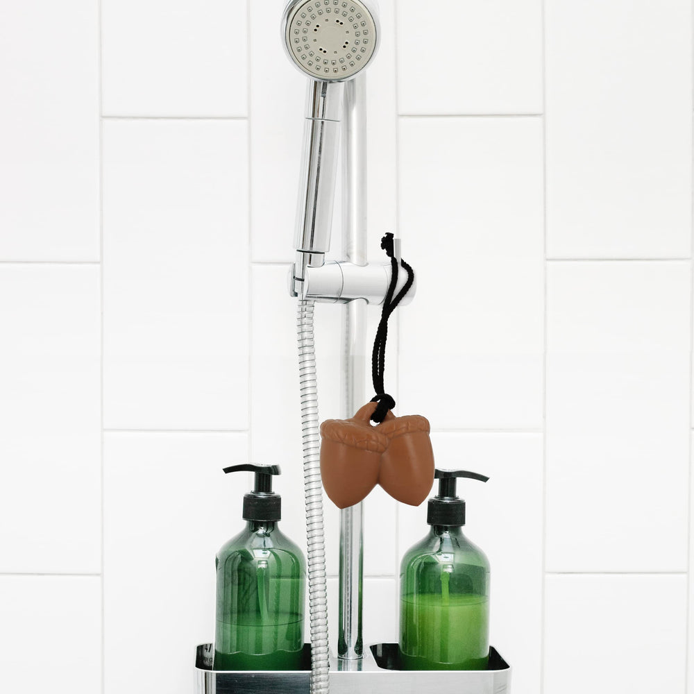 NPW Hello Handsome acorn motif hangs in shower for easy grab-and-go cleansing.