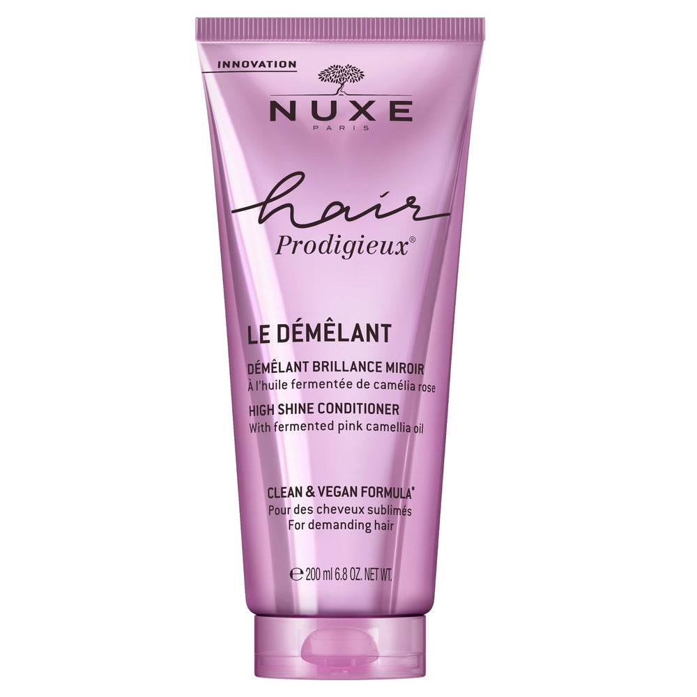 Nuxe Hair Prodigieux High Shine Conditioner bottle for instant detangling and radiant shine.