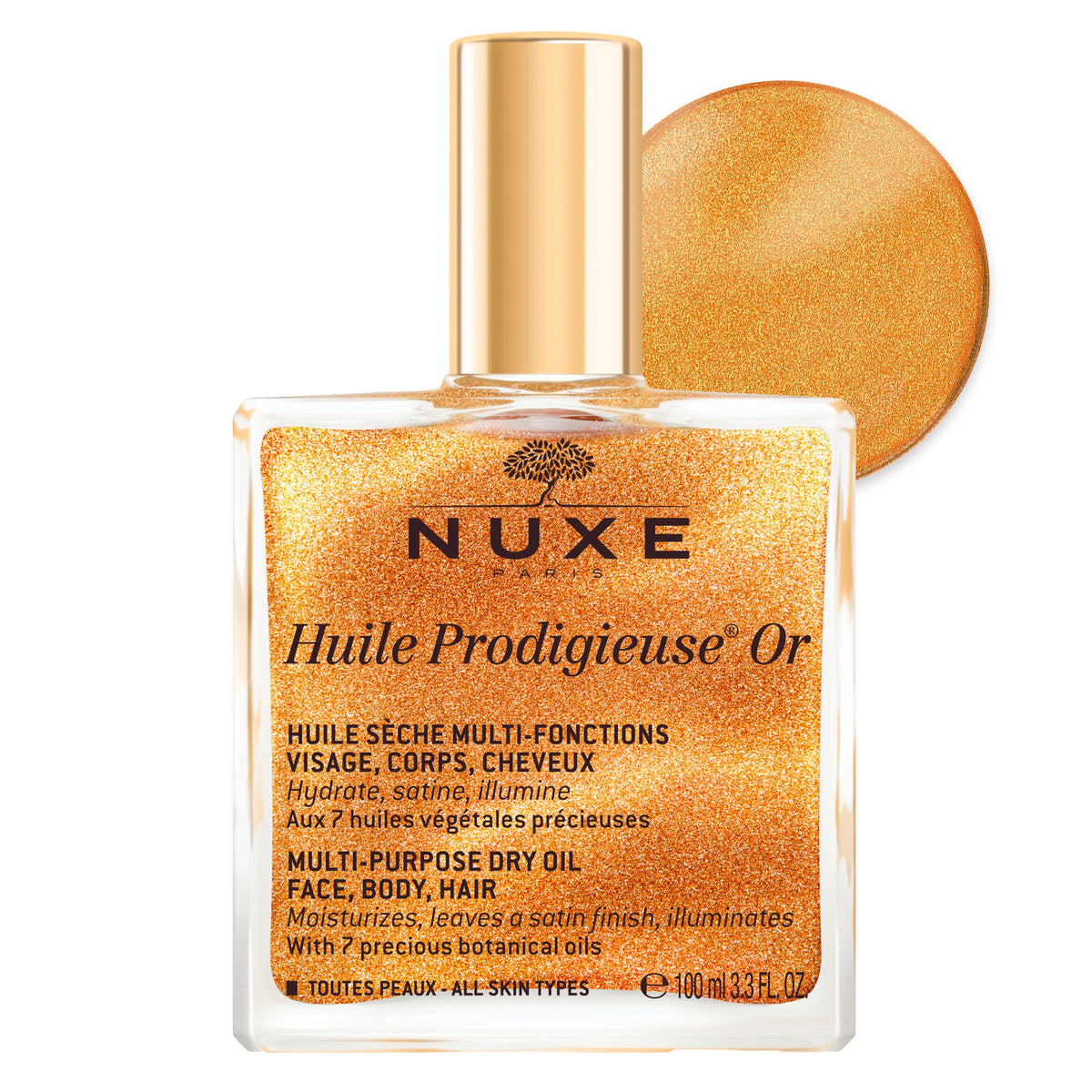Nuxe Huile Prodigieuse Shimmer bottle closeup highlights a luxurious multi-oil glow.