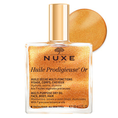 Nuxe Huile Prodigieuse Shimmer bottle closeup highlights a luxurious multi-oil glow.