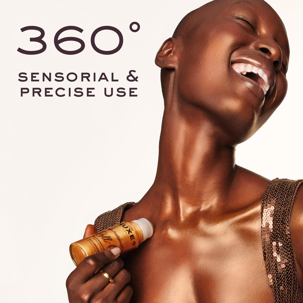 Nuxe Huile Prodigieuse Shimmer on the face with a soft golden glow.