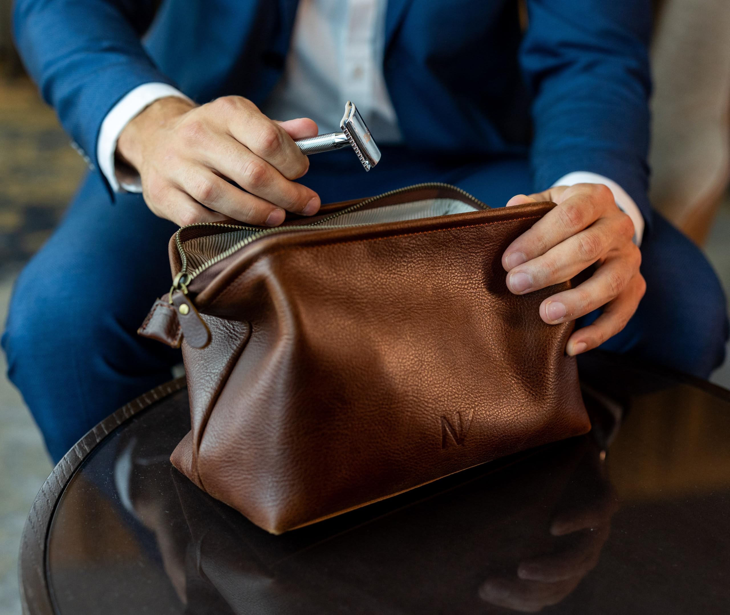 NV Holders brown stitch detail highlights handcrafted European craftsmanship.