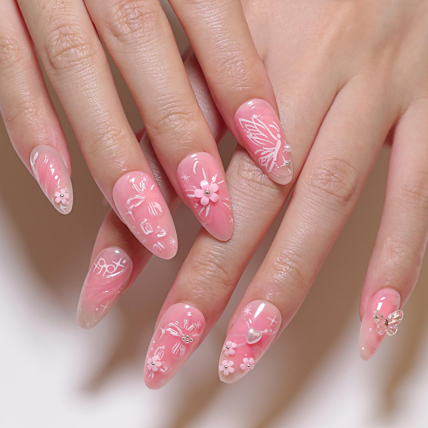 NZRAESTRS gold bead embellishments on nails for subtle luxe touch