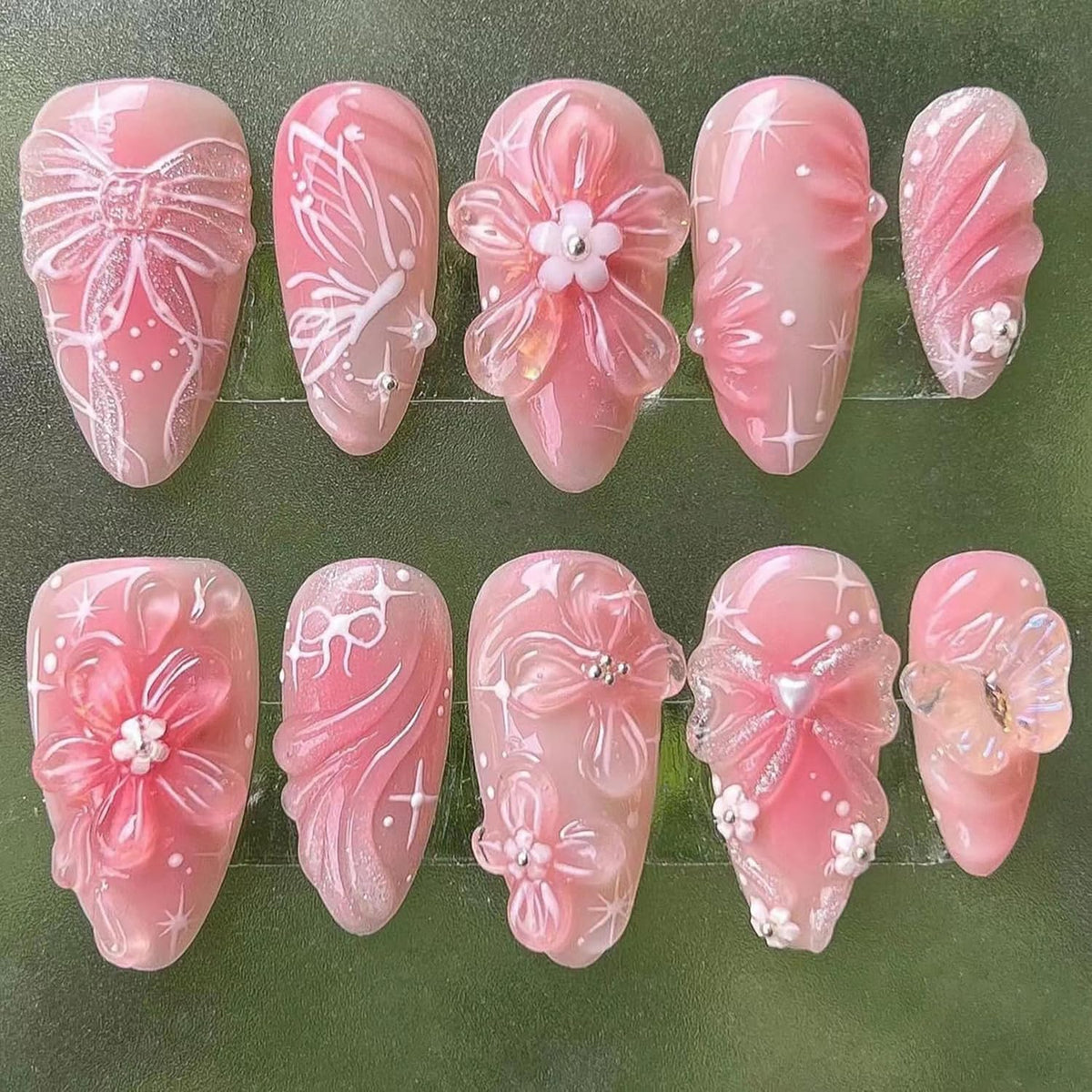 NZRAESTRS pink press-on nails with 3D flower design for fast at-home manicures