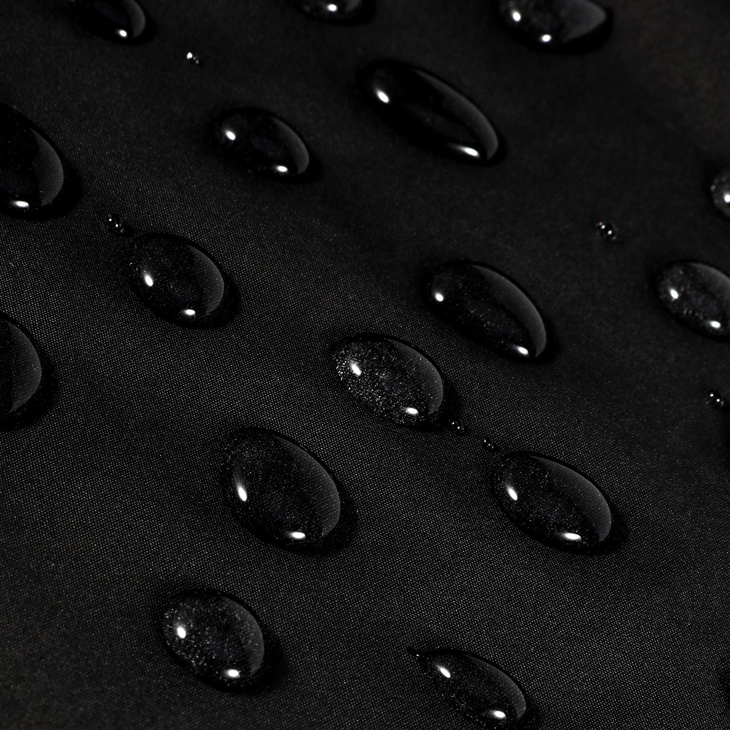Oak Leaf hair cutting cape fabric close-up highlighting water-resistant material.
