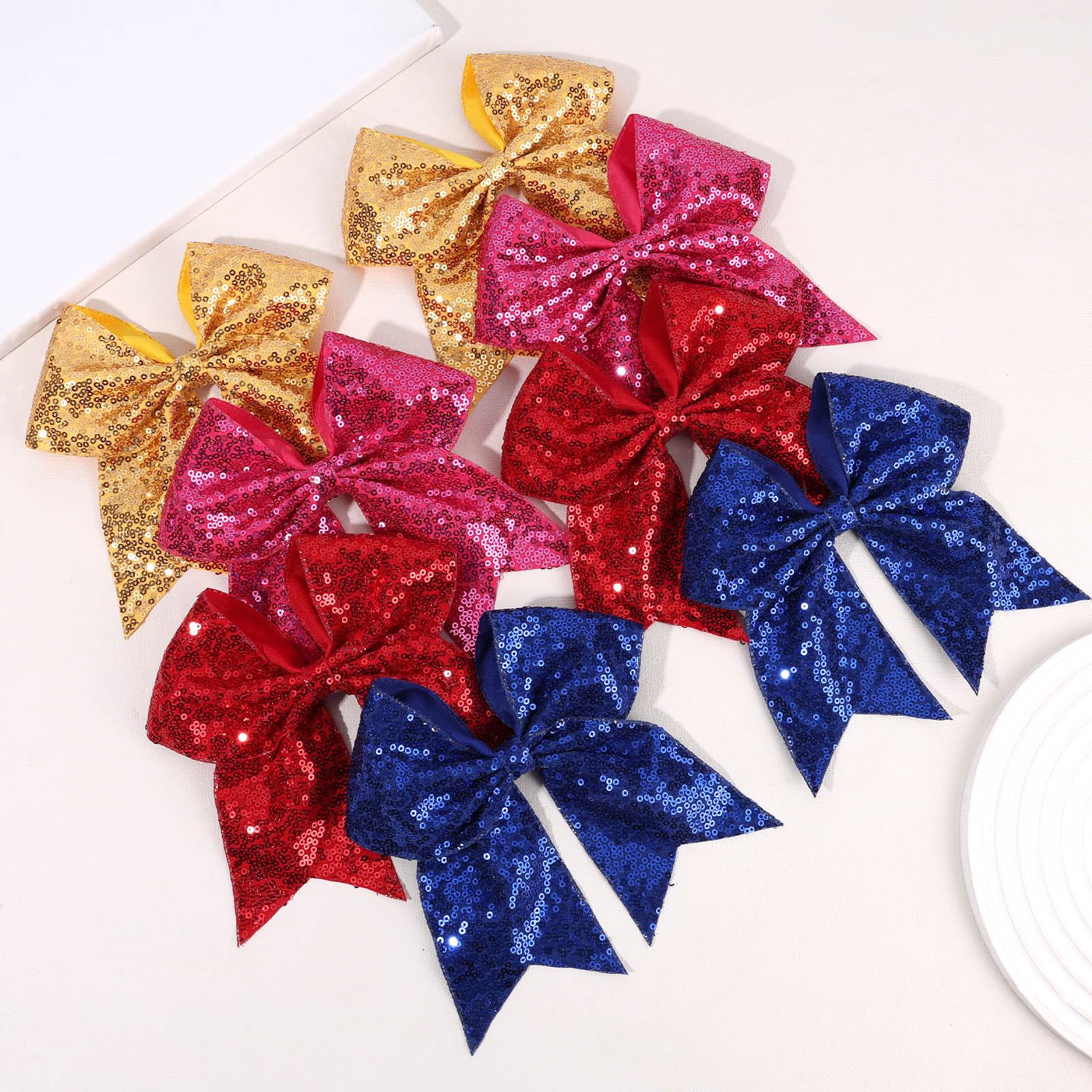 OAOLEER 7-inch cheer bows brighten backpacks and lockers with sparkle.