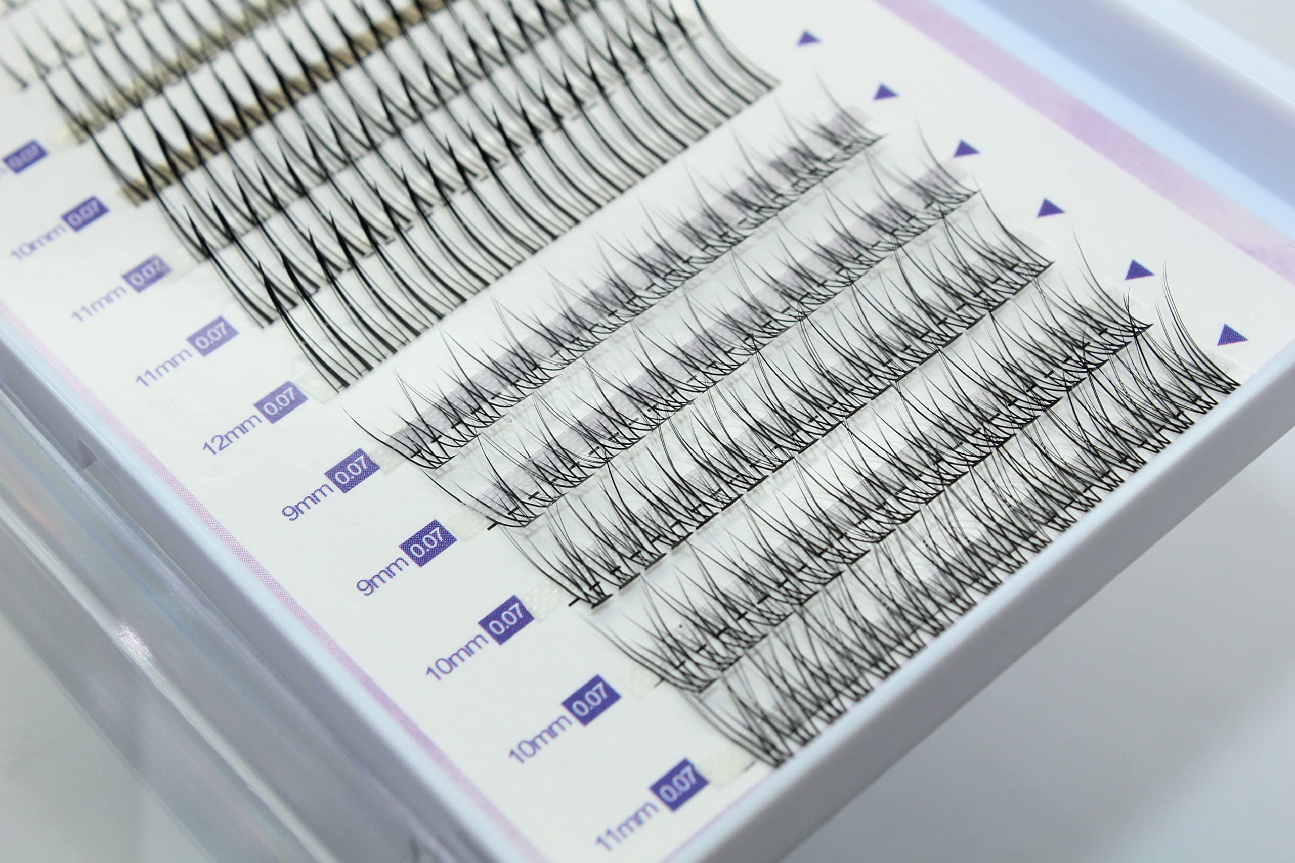 OAWLY Saibinuo natural clusters for seamless lash blending.