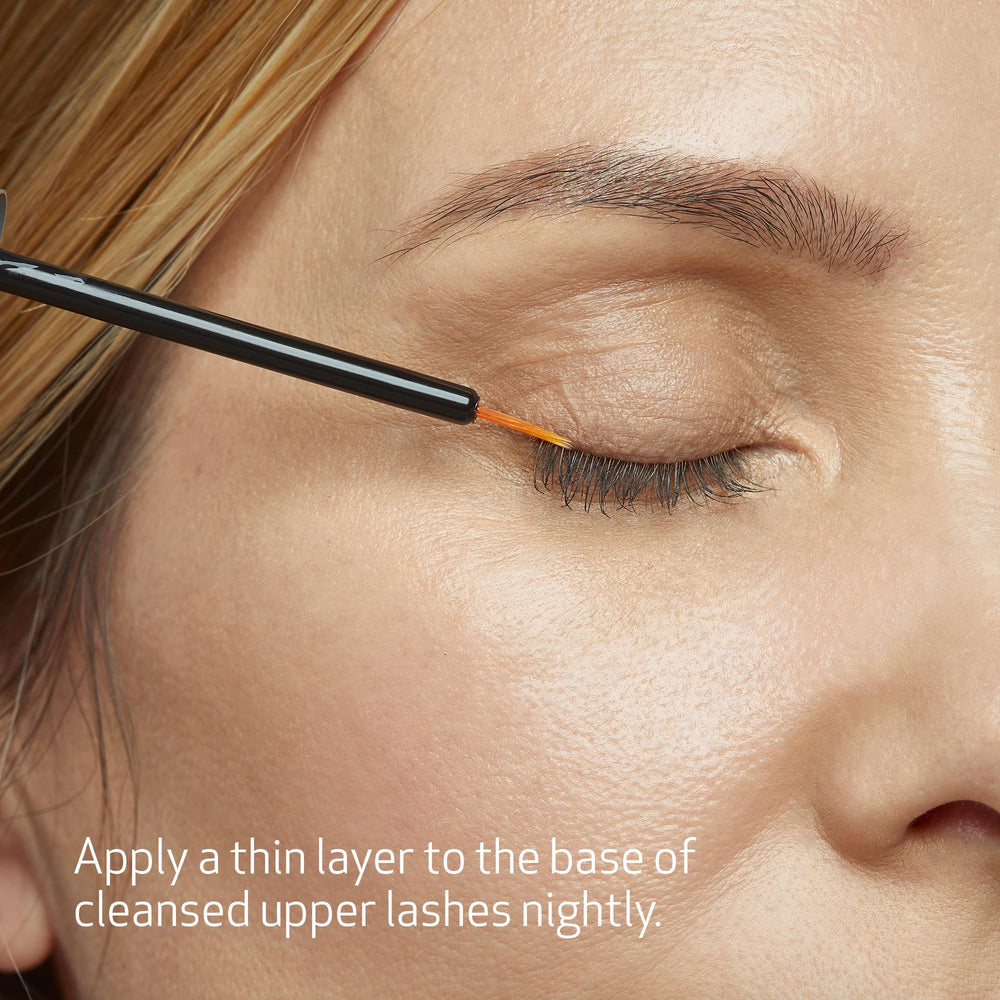 Obagi Nu-Cil serum application brush shows targeted lash-line delivery for daily use.