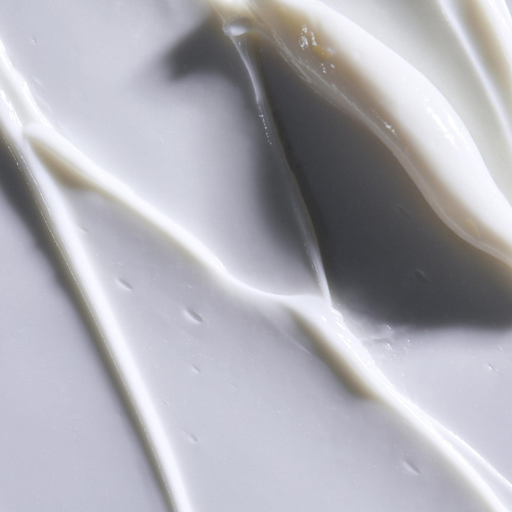 Obagi Rebalance cream jar close-up showing creamy hydration for sensitive skin.