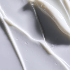 Obagi Rebalance cream jar close-up showing creamy hydration for sensitive skin.